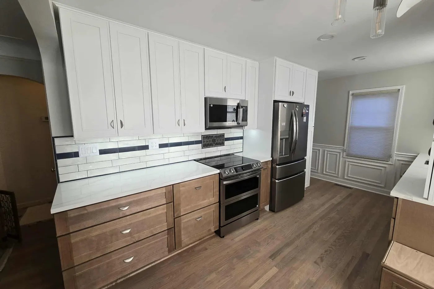 The same kitchen, full cabinet run