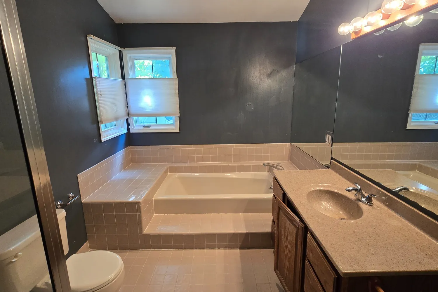 Before: corner drop-in tub in the West Bloomfield primary bath