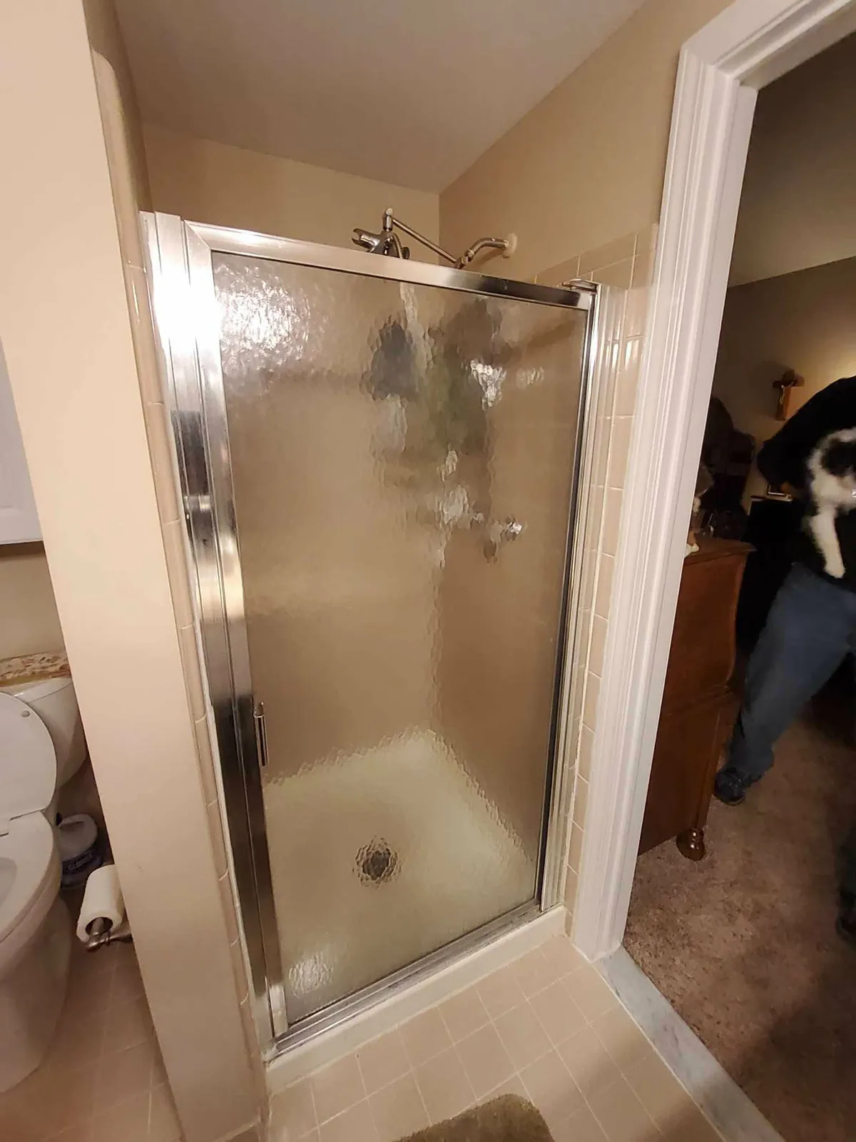 Before: the old framed shower stall