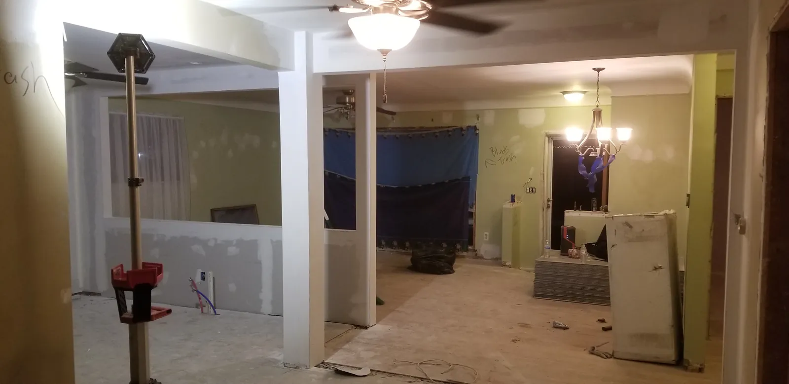The opening cased and drywalled from the living room side