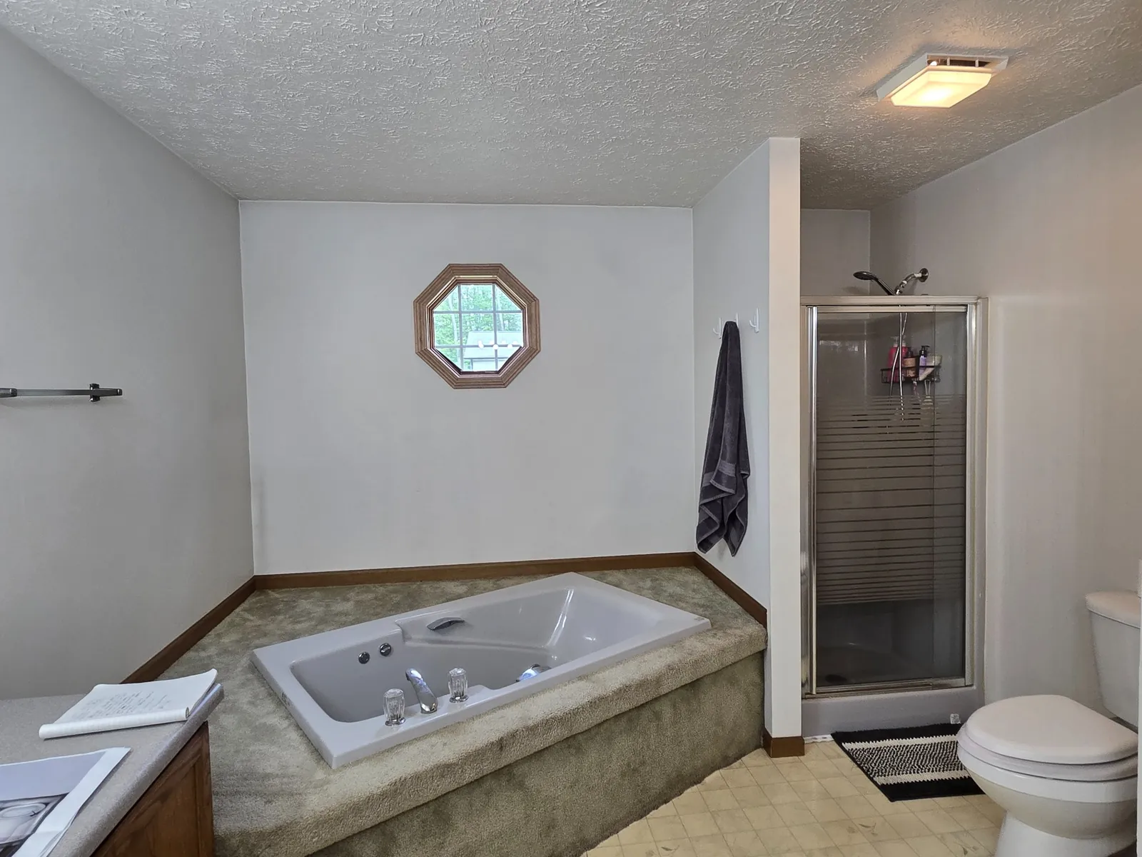 Before: the jetted tub deck and octagon window