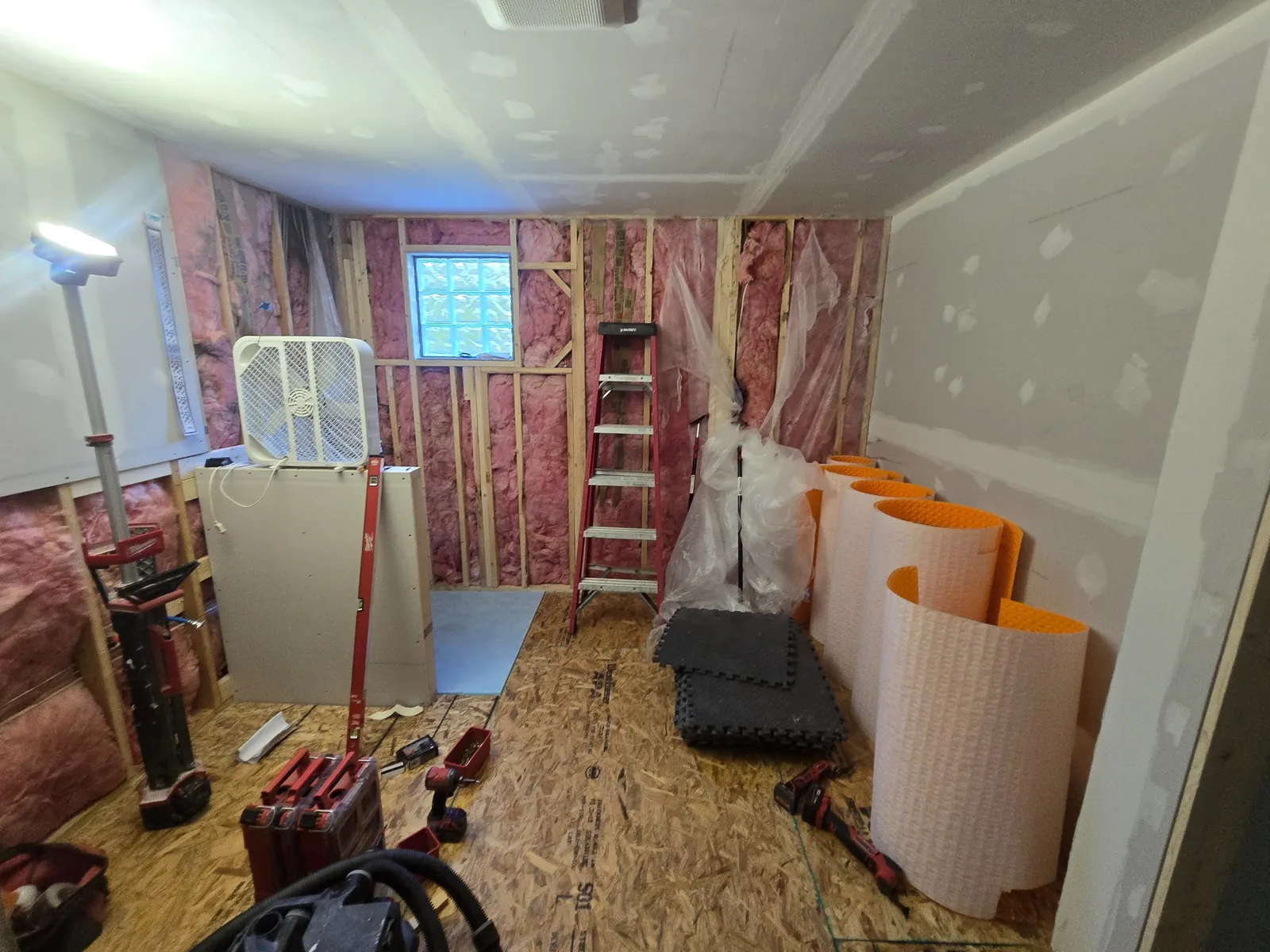 Demo done: fresh insulation and waterproofing staged