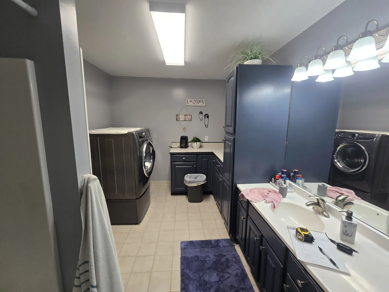 Before: laundry and bathroom crowded into one room