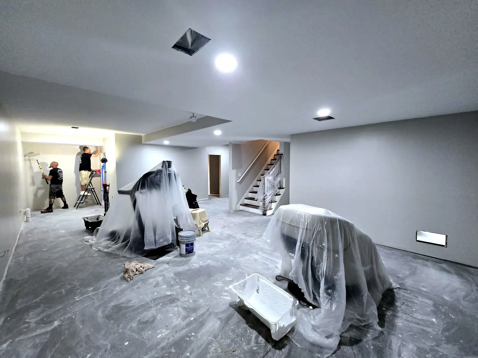 Drywalled and primed, stairs trimmed