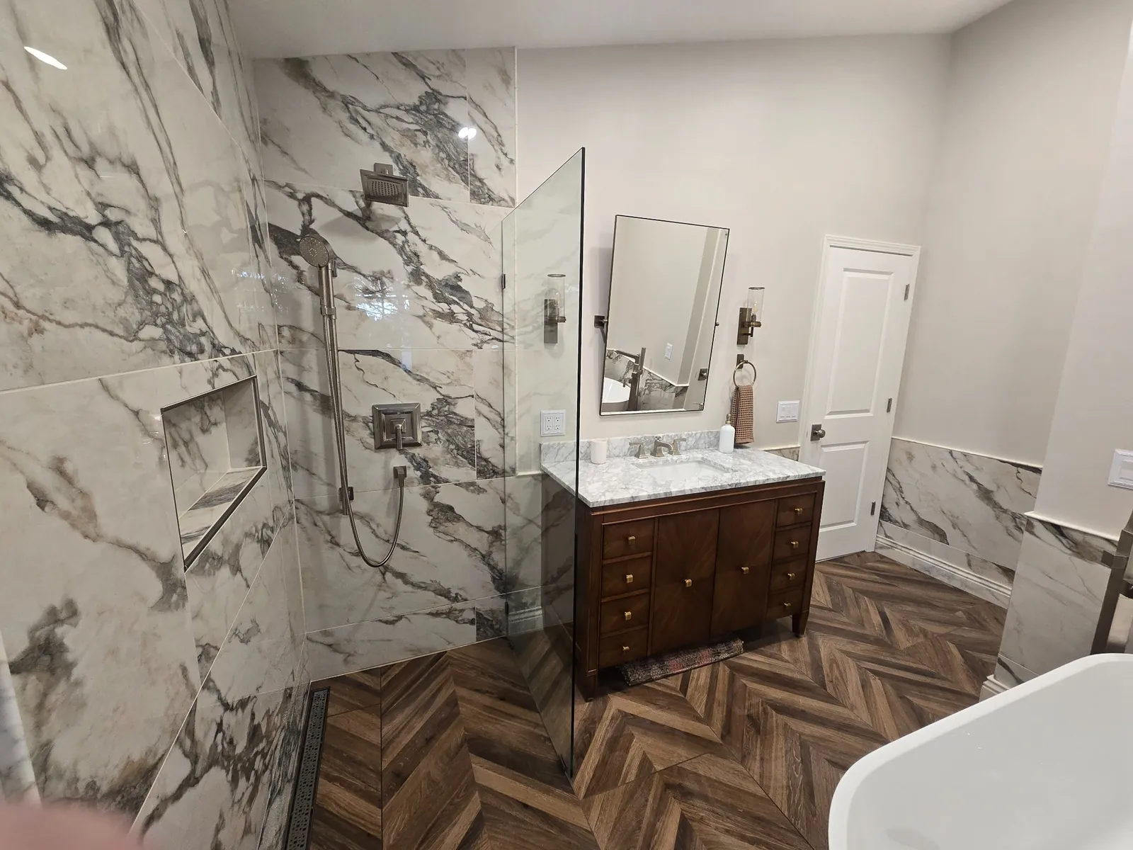 Finished: glass walk-in shower beside the custom vanity
