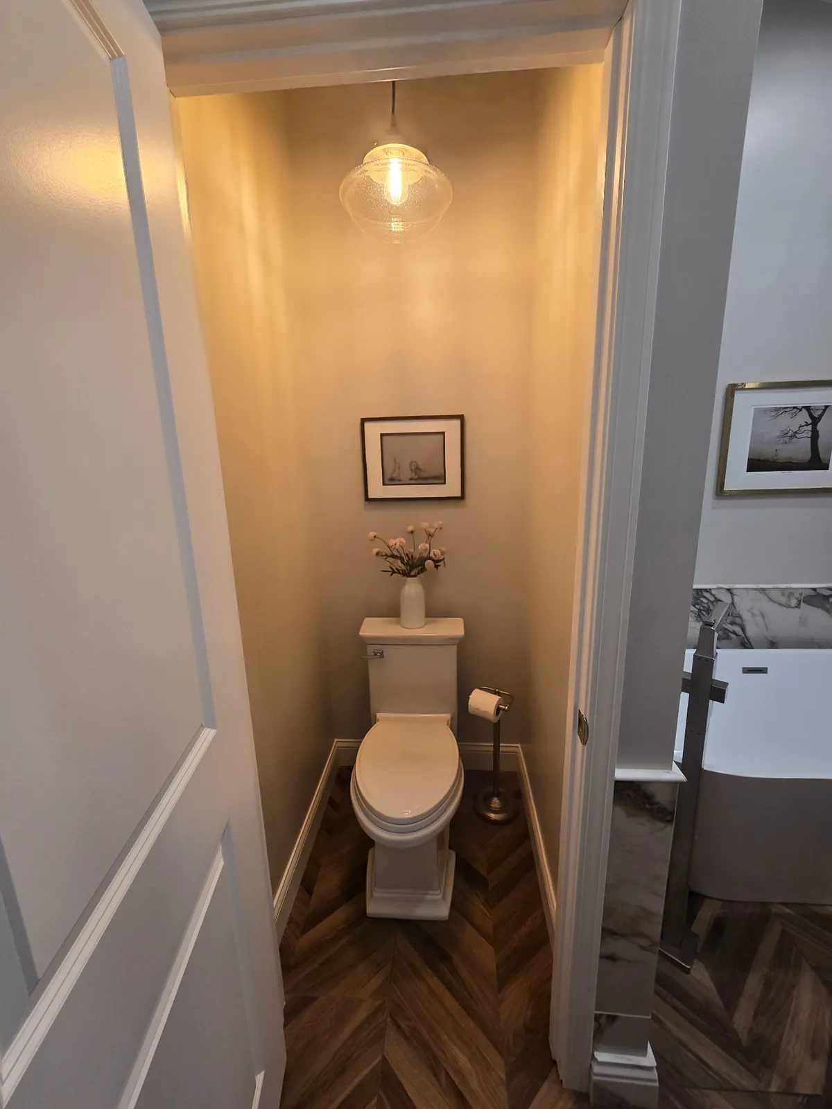 Finished: a private water closet off the main bathroom